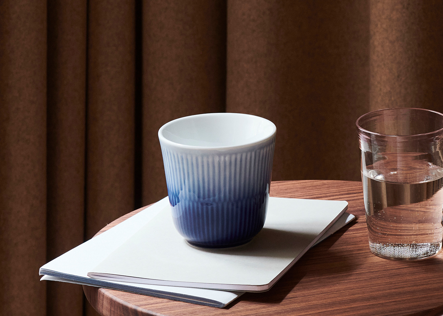 Blue Mist Thermal Mug in a moody setting
